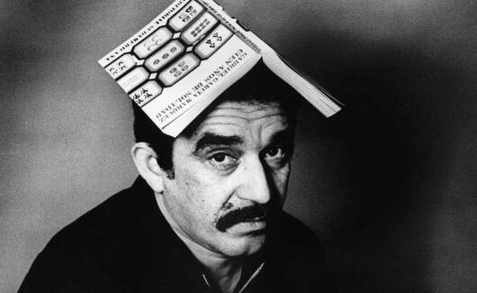 Gabriel Garcia Marquez with Book on Head