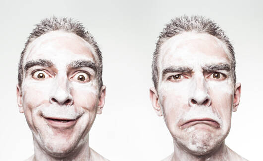 lachend en triestig gezicht